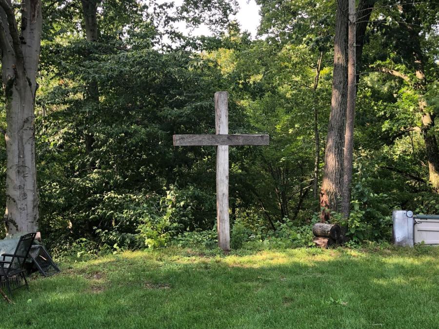 wooden cross in grass