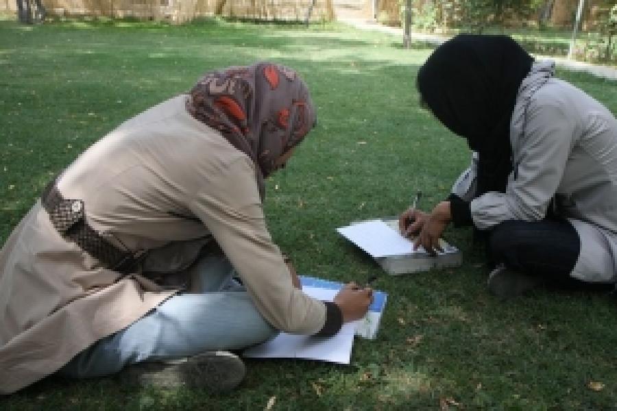 Afghan women writing