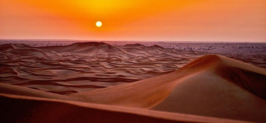 Desert dunes at sunset