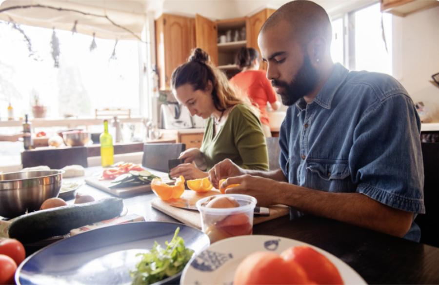 2 people prepare food in an Innovative Learning and Living Institute program