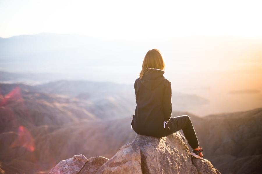 woman looking out over Grand Canyon