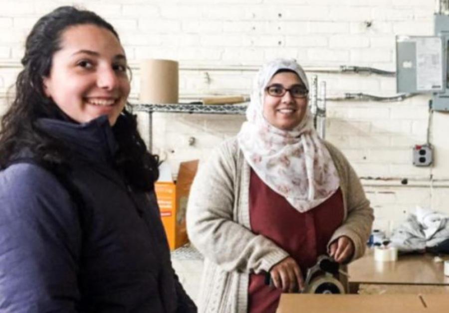 Two women working together