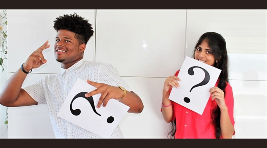 QUESTion project students Daniel and Shampa holding question marks