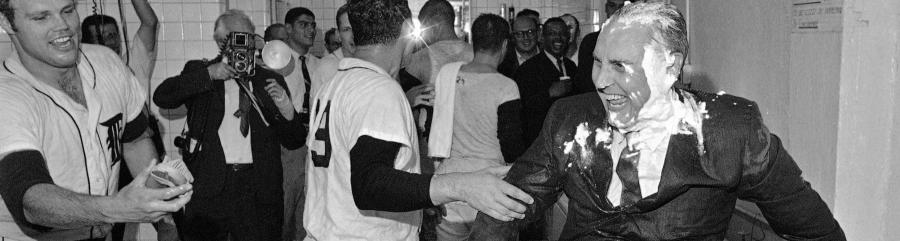 Image of Mr. Fetzer getting dunked into a bathtub in the Detroit Tigers locker room.