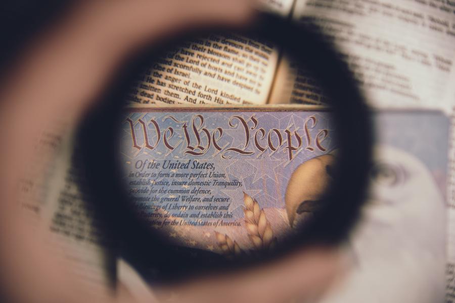 We the People image with Bible verse in background