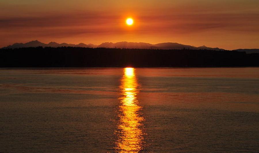 Sunset over body of water