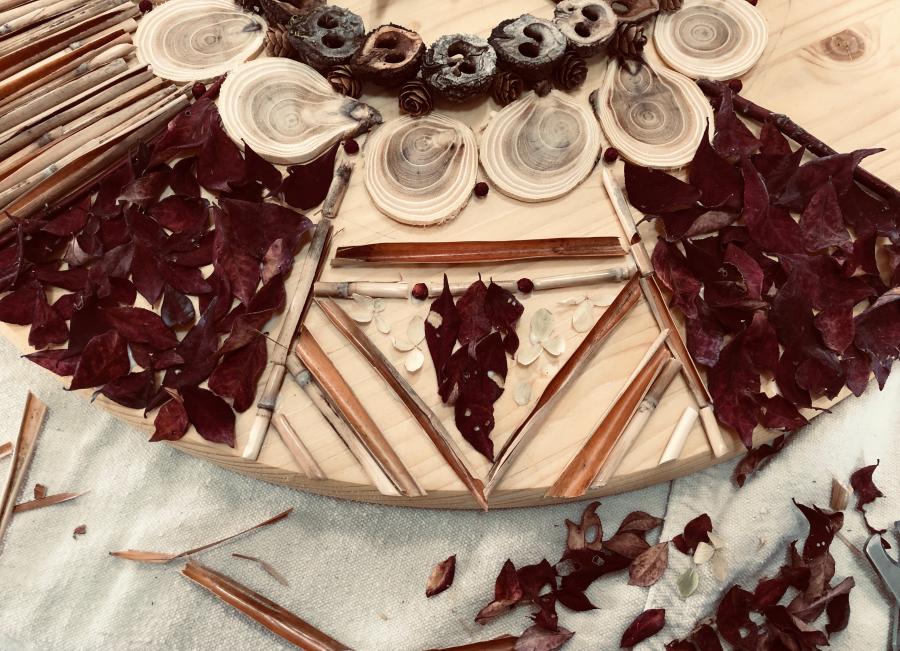 mandala with natural elements - leaves, flowers, branches