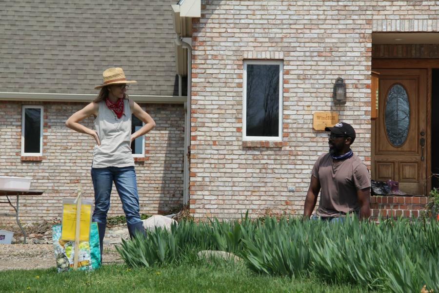 woman and man working in garden